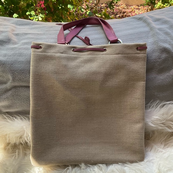 YVES SAINT LAURENT
Leather Heart Embellished Canvas Tote Bag - Picture 3 of 12